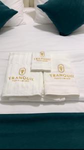 Krevet ili kreveti u jedinici u okviru objekta Tranquil Oasis Hotel