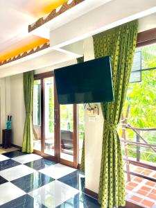 TV a/nebo společenská místnost v ubytování AC 2 Resort + 37 fotografií