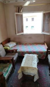 Postel nebo postele na pokoji v ubytování Downtown Cairo Gem