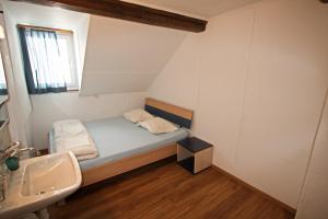 Letto o letti in una camera di juhui Flumserberg