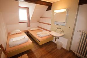 Letto o letti in una camera di juhui Flumserberg