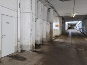 an empty hallway of an old building with a long corridor at Meije 11 a1 in Les Deux Alpes
