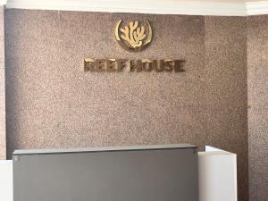 Certifikát, hodnocení, plakát nebo jiný dokument vystavený v ubytování Reef House