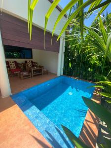 Bazén v ubytování Siargao Sunset Bay Beach Villas nebo v jeho okolí
