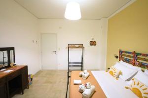 Postel nebo postele na pokoji v ubytování Studio Florio