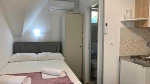Posteľ alebo postele v izbe v ubytovaní Bed&Breakfast Đurđan