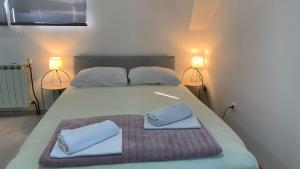Posteľ alebo postele v izbe v ubytovaní Bed&Breakfast Đurđan