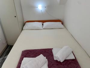 Posteľ alebo postele v izbe v ubytovaní Bed&Breakfast Đurđan