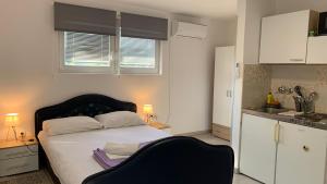 Posteľ alebo postele v izbe v ubytovaní Bed&Breakfast Đurđan