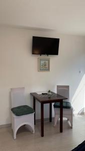 Televízia a/alebo spoločenská miestnosť v ubytovaní Bed&Breakfast Đurđan