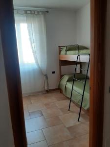 Postel nebo postele na pokoji v ubytování La BumBasina