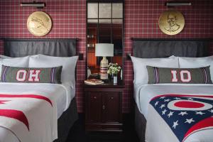 Cama ou camas em um quarto em Graduate by Hilton Columbus