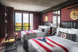 Cama ou camas em um quarto em Graduate by Hilton Columbus