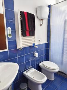 Ένα μπάνιο στο Rosso rubino +10 φωτογραφίες