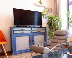 TV a/nebo společenská místnost v ubytování Ferienwohnung Enjoy Gӧrlitz - Parkplatz