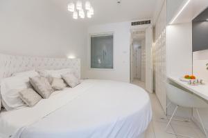 Postel nebo postele na pokoji v ubytování Hotel Al Cavallino Bianco