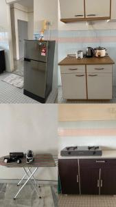 Kuchyň nebo kuchyňský kout v ubytování OVR Homestay Teluk Kemang Portdickson