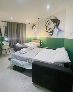A bed or beds in a room at O.Effe. Suites / Vatican Még 37 kép