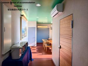 A cozinha ou kitchenette de 湯と風の宿 恵比寿