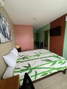 Hotel Mi Linda Tierra客房内的一张或多张床位
