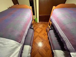 Postel nebo postele na pokoji v ubytování Conquistador Hotel