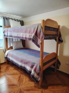 Postel nebo postele na pokoji v ubytování Conquistador Hotel