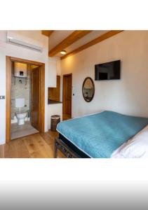 Postel nebo postele na pokoji v ubytování Obala apartman