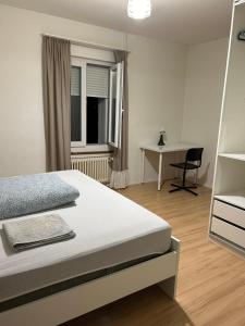 Postel nebo postele na pokoji v ubytování Rocco Guesthouse