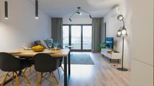 Ruang duduk di Luksusowy apartament ze SPA