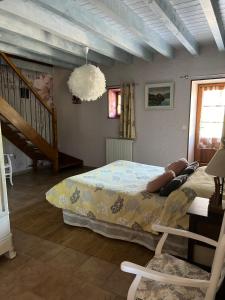 Postel nebo postele na pokoji v ubytování La Grange de Félix