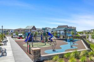 a playground at a park at a resort at Cozy Retreat facing Western Park in Tracy