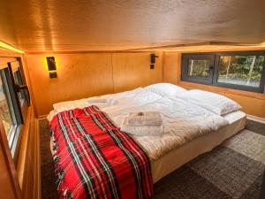 Postel nebo postele na pokoji v ubytování ARIETES MARMONT Tiny Houses + 33 fotografií