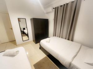 Postel nebo postele na pokoji v ubytování Stylish and modern apartment