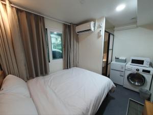 Beyond Residence Jongnoにあるベッド