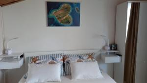 Postel nebo postele na pokoji v ubytování Felix Apartment Biograd