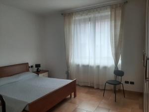 Postel nebo postele na pokoji v ubytování La BumBasina