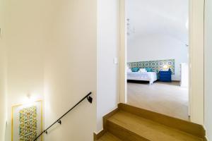 Кровать или кровати в номере Casa vacanze Mura Antiche