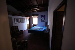 A bed or beds in a room at Casamatta a Blera