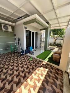 Postel nebo postele na pokoji v ubytování Mangga Homestay Ponorogo