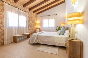 Postel nebo postele na pokoji v ubytování Villa Muro Garden + 24 fotografií