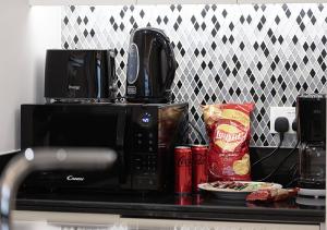 Kaffee-/Teezubehör in der Unterkunft 5 Star High Rise Luxury Apartment, Infinity Pool With Stunning Burj View - Brand New Apartment