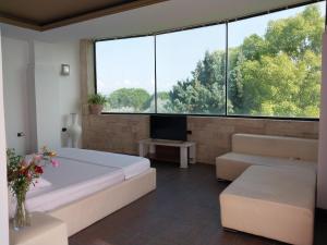 Llit o llits en una habitació de Hotel Different