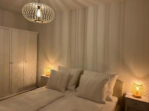 Postel nebo postele na pokoji v ubytování Villach City Comfort Suite