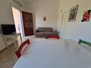 Et tv og/eller underholdning på Casa vacanza Mamaioa