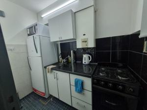 Kuchyň nebo kuchyňský kout v ubytování TREJO APART, A 40MTS DEL PATIO OLMOS, PLANTA BAJA