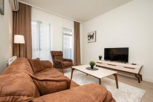 Μια τηλεόραση ή/και κέντρο ψυχαγωγίας στο Belgrade Waterfront Apartments - Libera