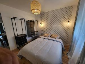 Postel nebo postele na pokoji v ubytování Appartement T2 Frangy