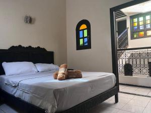 Postel nebo postele na pokoji v ubytování Riad benhamo