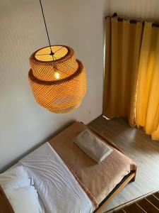 Postel nebo postele na pokoji v ubytování Chambre et sdb avec entrée privative