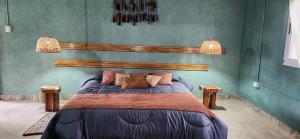 Postel nebo postele na pokoji v ubytování Pomancillo Ecolodge